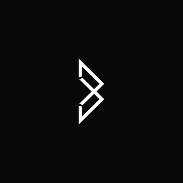 Minimal elegant monogram art logo. Outstanding professional trendy awesome artistic B BX XB initial based Alphabet icon logo. Premium Business logo White color on black background
