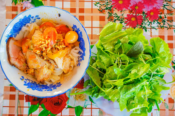 Vietnamese noodle Mi Quang at Tra Que vegetable village, Hoi An old town, Vietnam