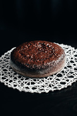 Chocolate cake tasty homemade cake on table side view dark food photo black background