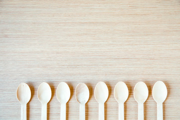 no plastic, clean, disposable food appliances, light wood spoons, with space for text and space for copying