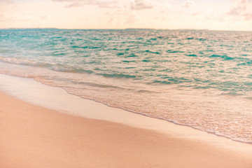Fototapeta na wymiar Sea sand sky concept, sunset colors clouds, horizon, horizontal background banner. Inspirational nature landscape, beautiful colors, wonderful scenery of tropical beach. Beach sunset, summer vacation 