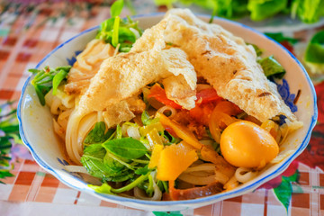 Vietnamese noodle Mi Quang at Tra Que vegetable village, Hoi An old town, Vietnam