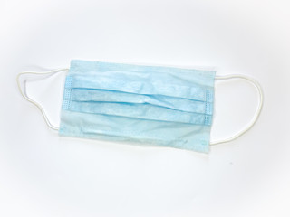 Antibacterial medical mask of blue color on a white background epidemic corona virus protection