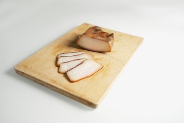 Fat on a wooden board, fat from Mangalitsa