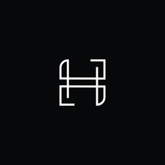 Minimal elegant monogram art logo. Outstanding professional trendy awesome artistic H HH initial based Alphabet icon logo. Premium Business logo White color on black background