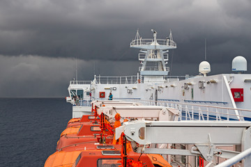Lifeboats of a ferry boat in navigation.