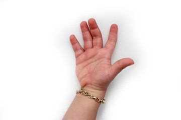 Baby hand with bracelet on a white background.