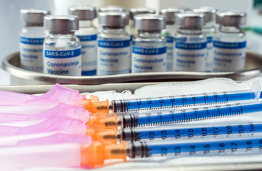 Coronavirus covid-19 experimental vaccine in a laboratory, conceptual image