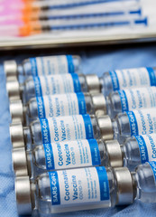 Coronavirus covid-19 experimental vaccine in a laboratory, conceptual image