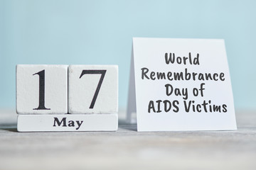 17 seventeenth World Remembrance Day of AIDS Victims May Month Calendar Concept on Wooden Blocks.
