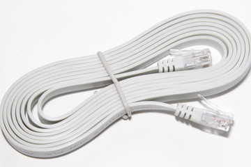 Patch cord with connectors RJ45. Gray computer network ethernet cable isolated on white background, closeup
