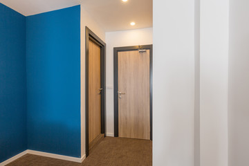 Entrance corridor interior in hotel apartment
