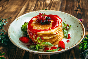 Sweet breakfast pancakes with berries