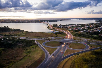 Brasilia`s Juscelino Kubitschek bridge and lake Paranoa at sunset