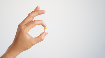 Fototapeta premium hand with medical pill