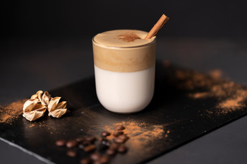 Dalgona coffee, soft, sparkling coffee with milk and a touch of cinnamon