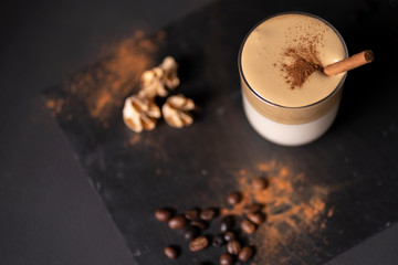 Dalgona coffee, soft, sparkling coffee with milk and a touch of cinnamon