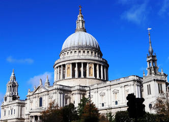 Fototapeta na wymiar St Pauls from a side view angle in London with sunny sky.