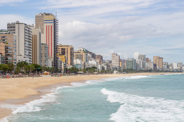 leblon beach with empty sand during the coronavirus pandemic in Rio de Janeiro.