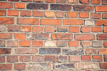 Closeup of an old red brick wall.