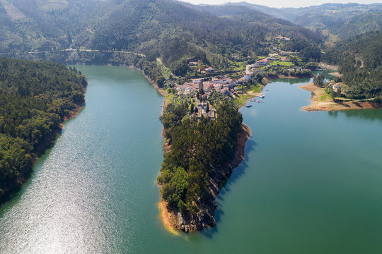 Dornes drone aerial view of city and landscape with river Zezere in Portugal