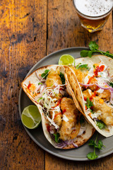Mexican fish tacos with cabbage and garlic mayo