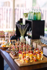 The food lies beautifully on the table, laid out in order, beautifully decorated