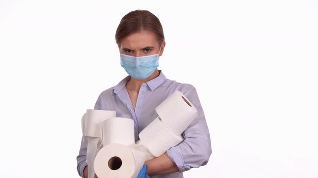 Young woman with toilet paper stock, COVID-19 coronavirus pandemic product panic concept