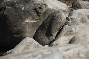 texture of huge stones, brown and gray, large powerful