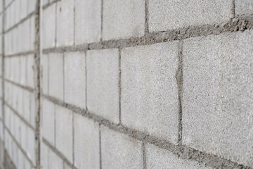White cement brick wall pattern close-up.