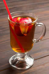 Summer refreshing drink with sliced apples.