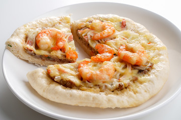 Pizza Cheese with Shrimp, Pork, Imitation Crab Stick and Salted Eggs on White Dish Wood Table on White Background Isolated.