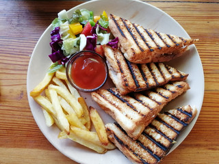 Tuna Sandwich This is a Mediterranean tuna sandwich. grilled and garnished with fresh salad and French fries