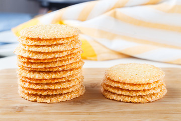 Group of cookies with sesame seeds on wooden board. healthy food. Close up view