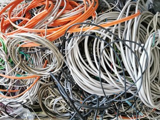 cable scrap collected in a box for melting down and recycling