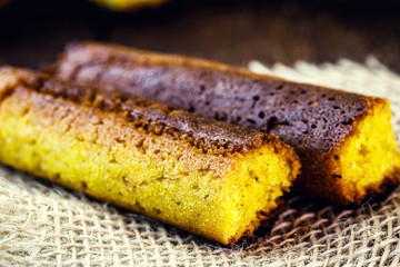 Broa made with corn and wrapped in banana leaf. Corn bread made for the June and July parties in Brazil. Brazilian cuisine.
