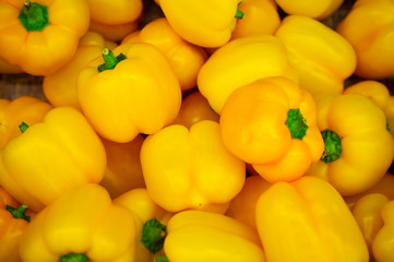 Yellow paprika pepper on the counter of the store