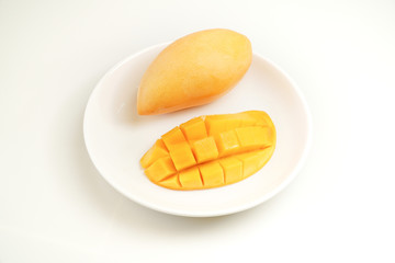 Fresh Mango on white plate and white background