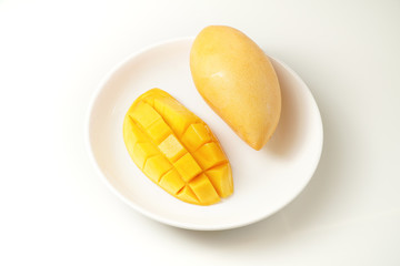 Fresh Mango on white plate and white background