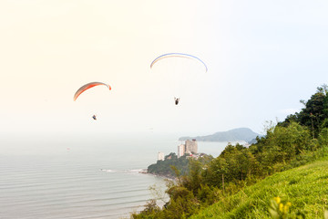 Several paragliders flying in São vicente