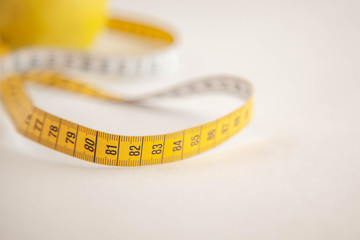Green apples measured the meter.Healthy food for weight loss.

