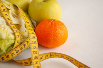 tasty food for weight loss. Slimming vegetables, tangerines and cabbage.