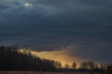 evening landscape with rain Cumulus clouds