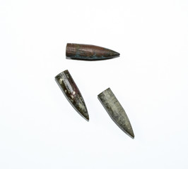 Old rusty bullets from Kalashnikov assault rifle.