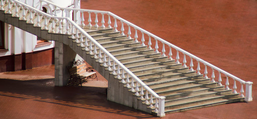 Large street stairs leading to the second floor of the building.