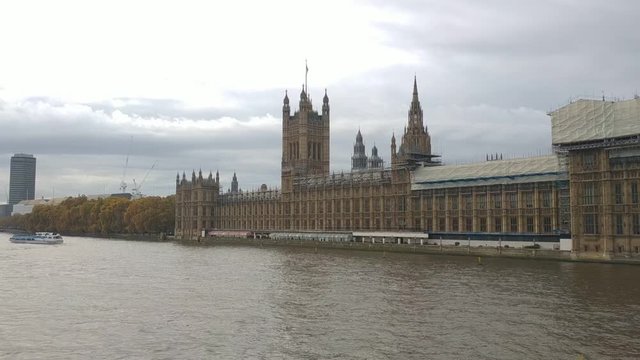 London, UK - November 09, 2020: view on The Palace of Westminster exterior at cloudy weather