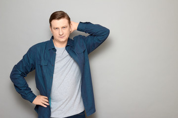 Portrait of happy confident man standing in relaxed position