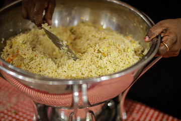 Fried Rice in banquet table with chafing dish heaters.