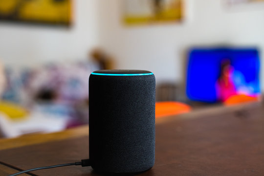 Alexa smart home assistant device by Amazon connected in living room