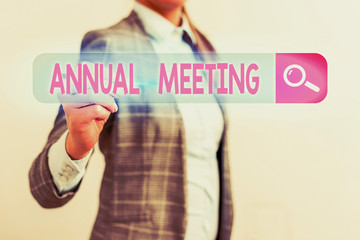 Conceptual hand writing showing Annual Meeting. Concept meaning a meeting of the general membership...